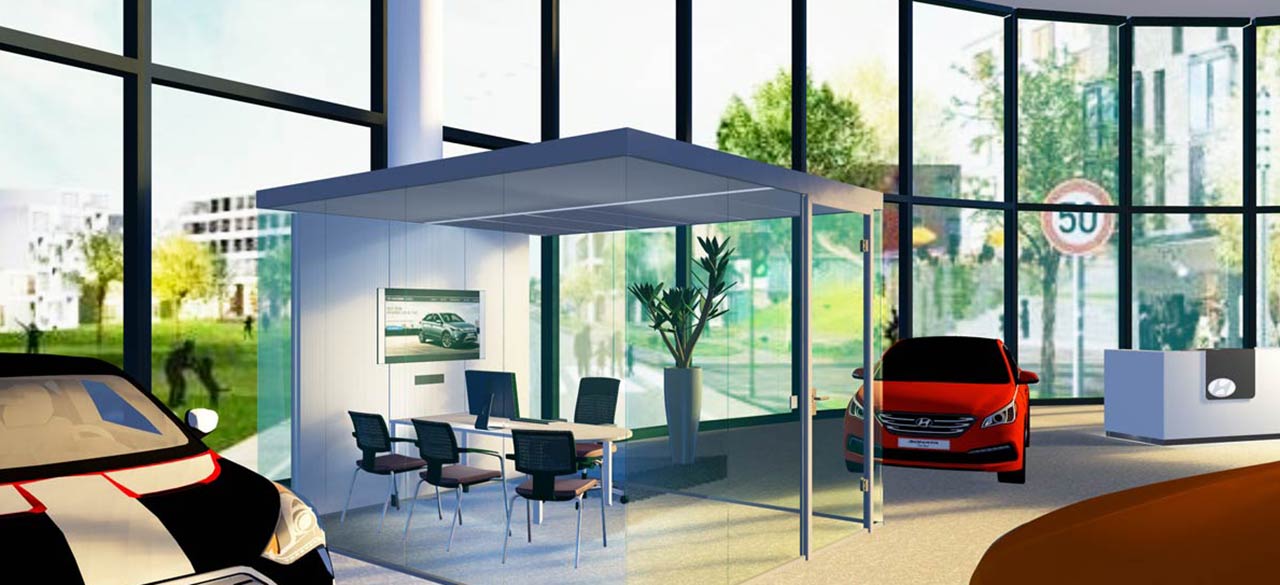 Raum in Raum frei stehend im Autohaus Raum in Raum Lösung für ein Verkäuferbüro