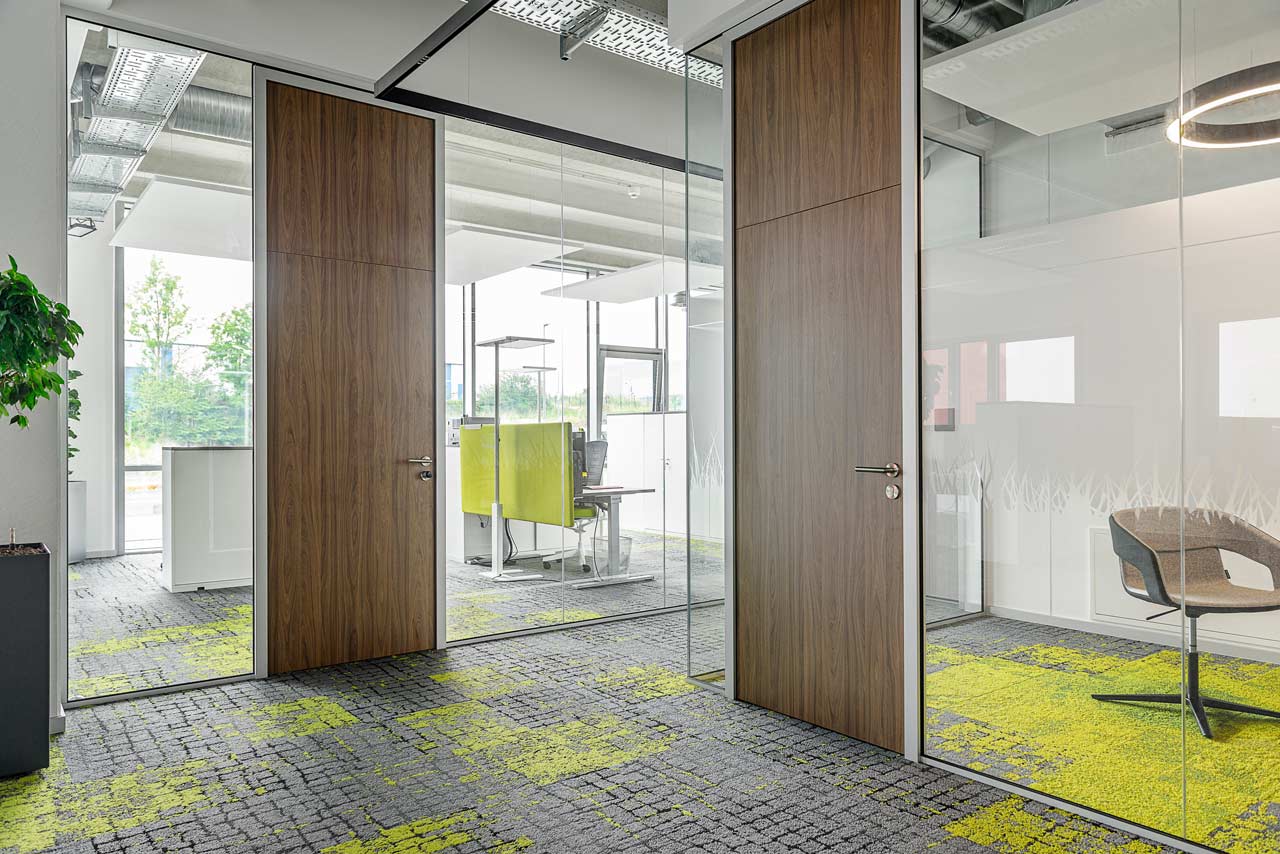 The glass wall with sliding door in the office
